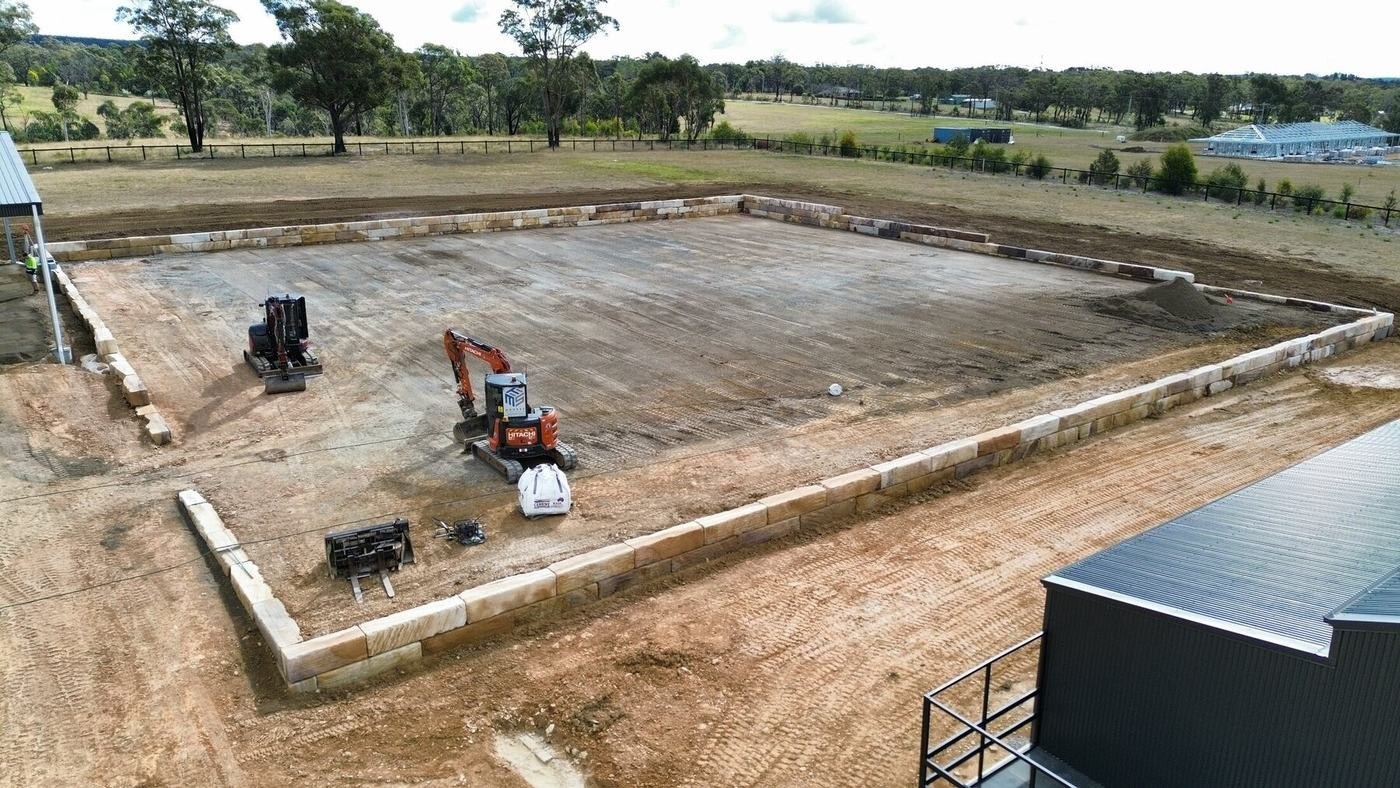 Aerial view of MTS earthworks and sandstone retaining at a Buxton equine property